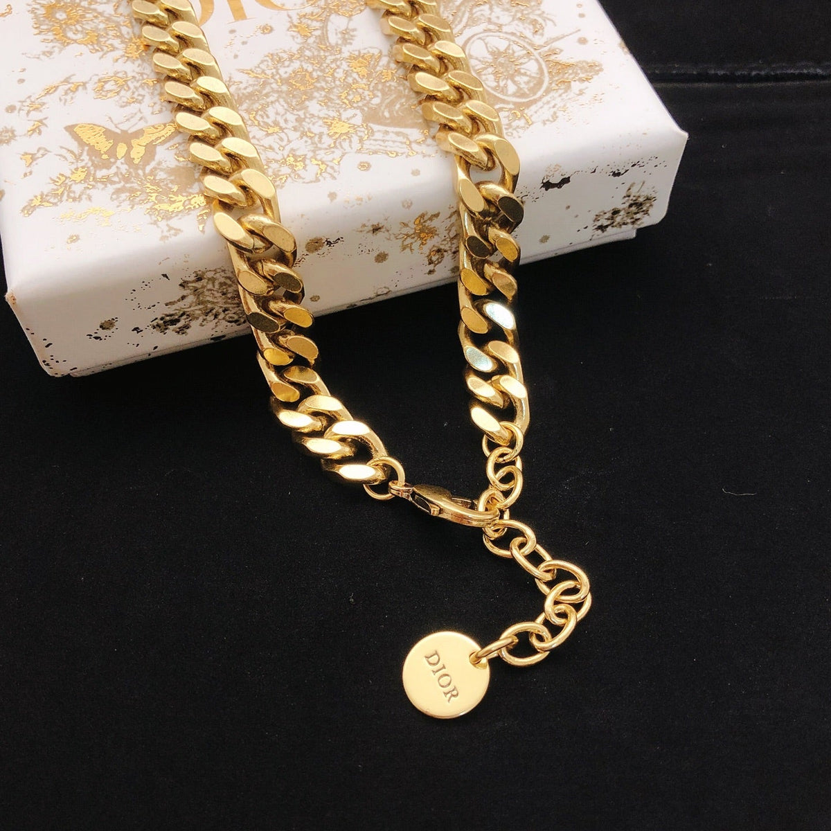Martin Graham pendant necklace in polished metal-tone – front view