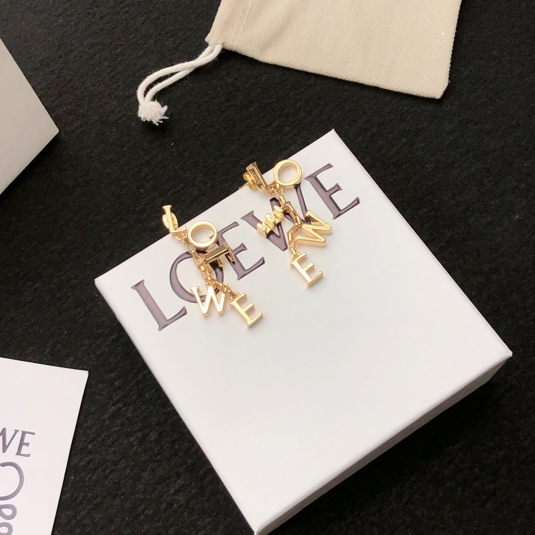 Martin Graham stud earrings in polished metal-tone – front view
