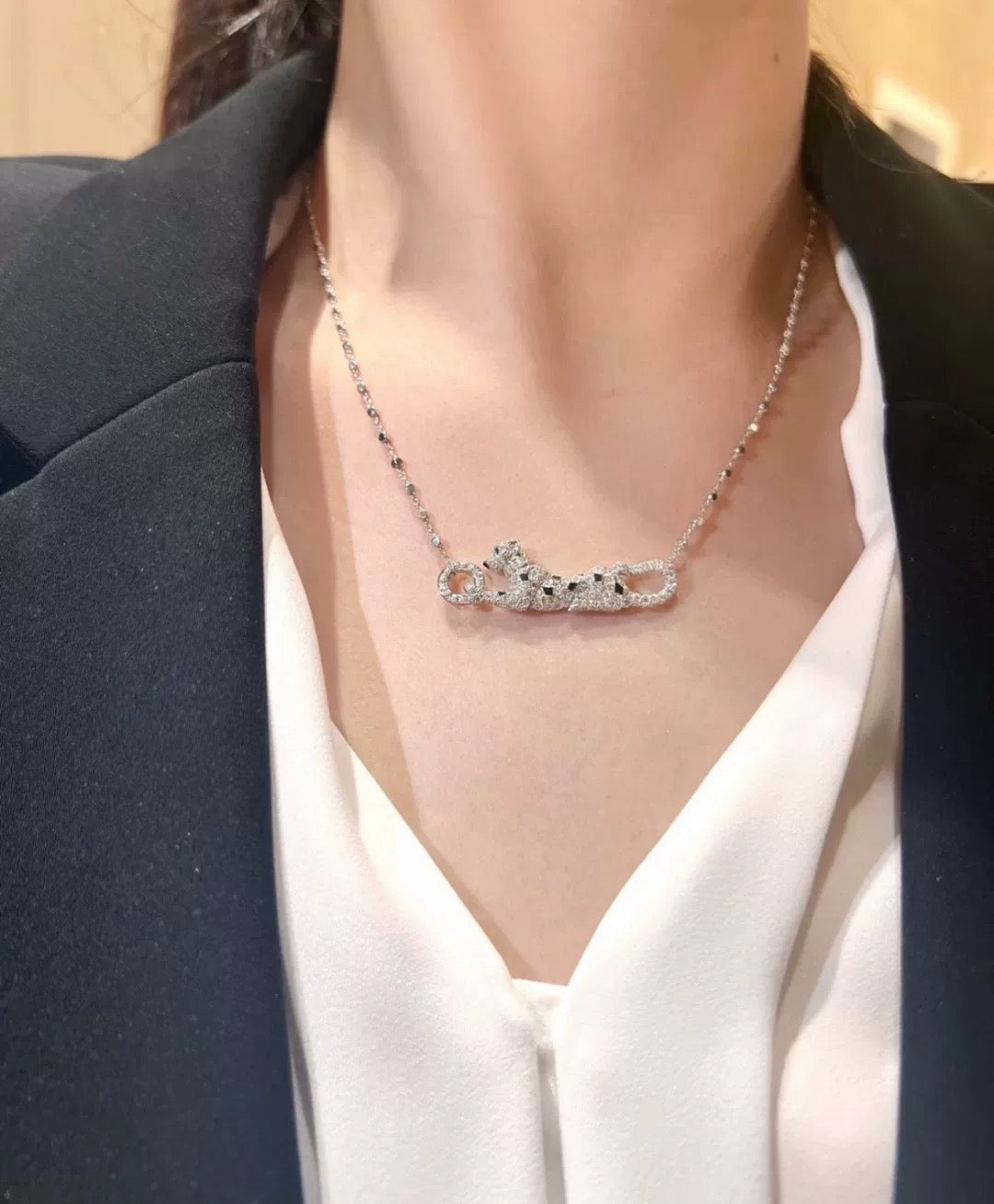 Martin Graham pendant necklace in polished metal-tone – front view