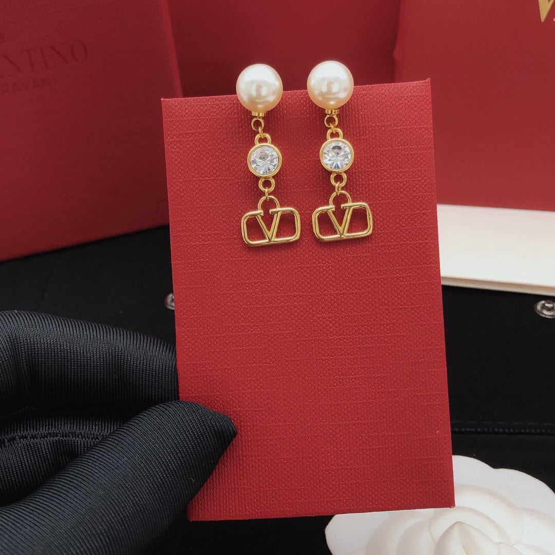 Martin Graham stud earrings in polished metal-tone – front view