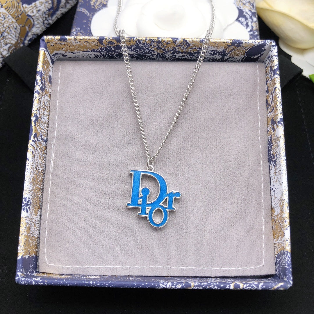 Martin Graham pendant necklace in polished metal-tone – front view