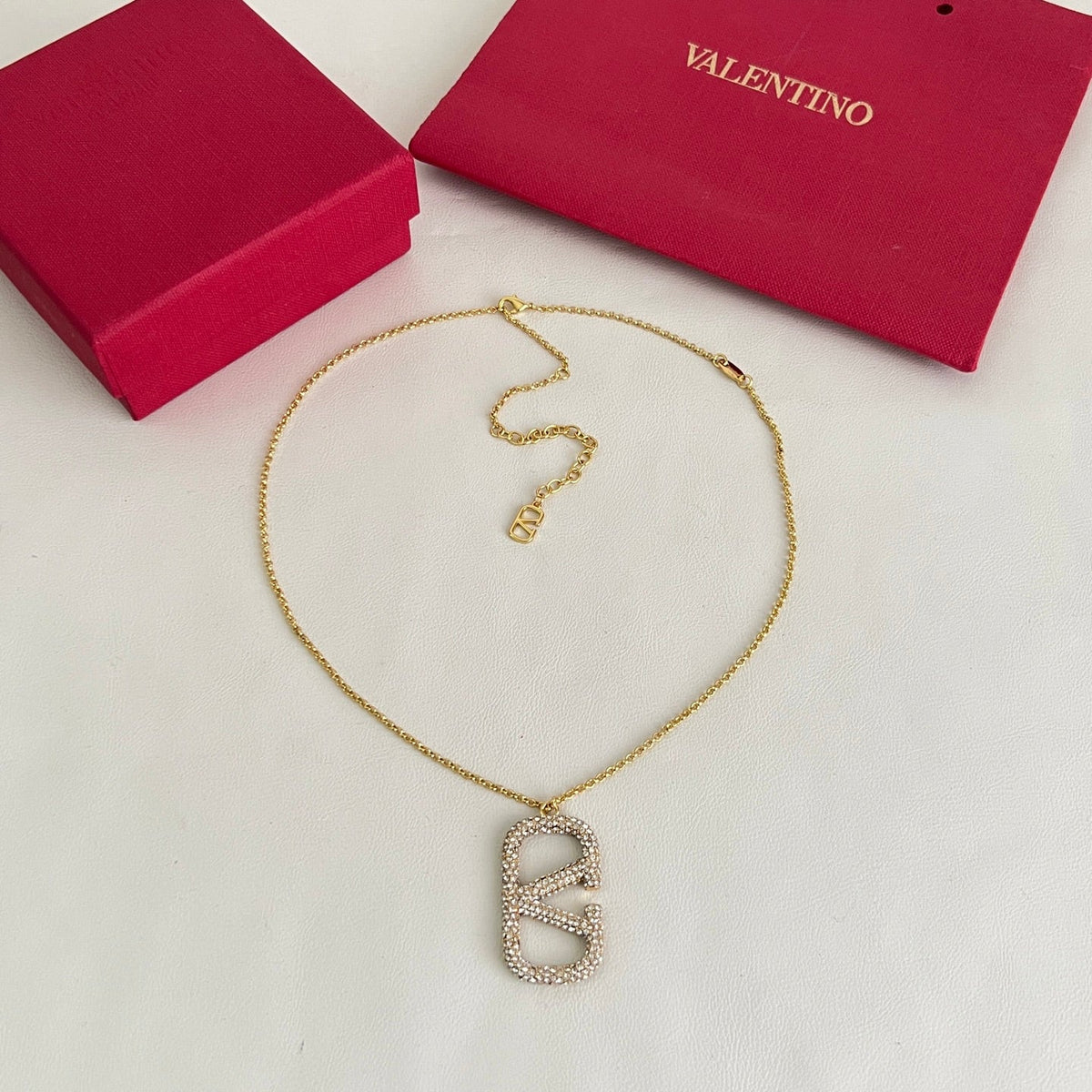 Martin Graham pendant necklace in polished metal-tone – front view