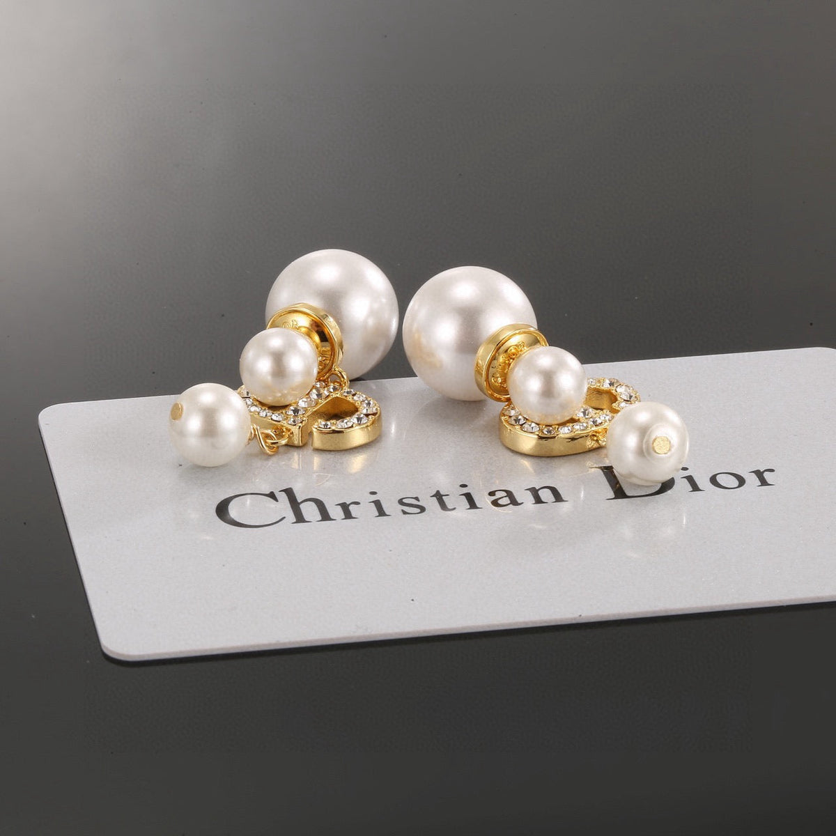 Martin Graham earrings in polished metal-tone – front view