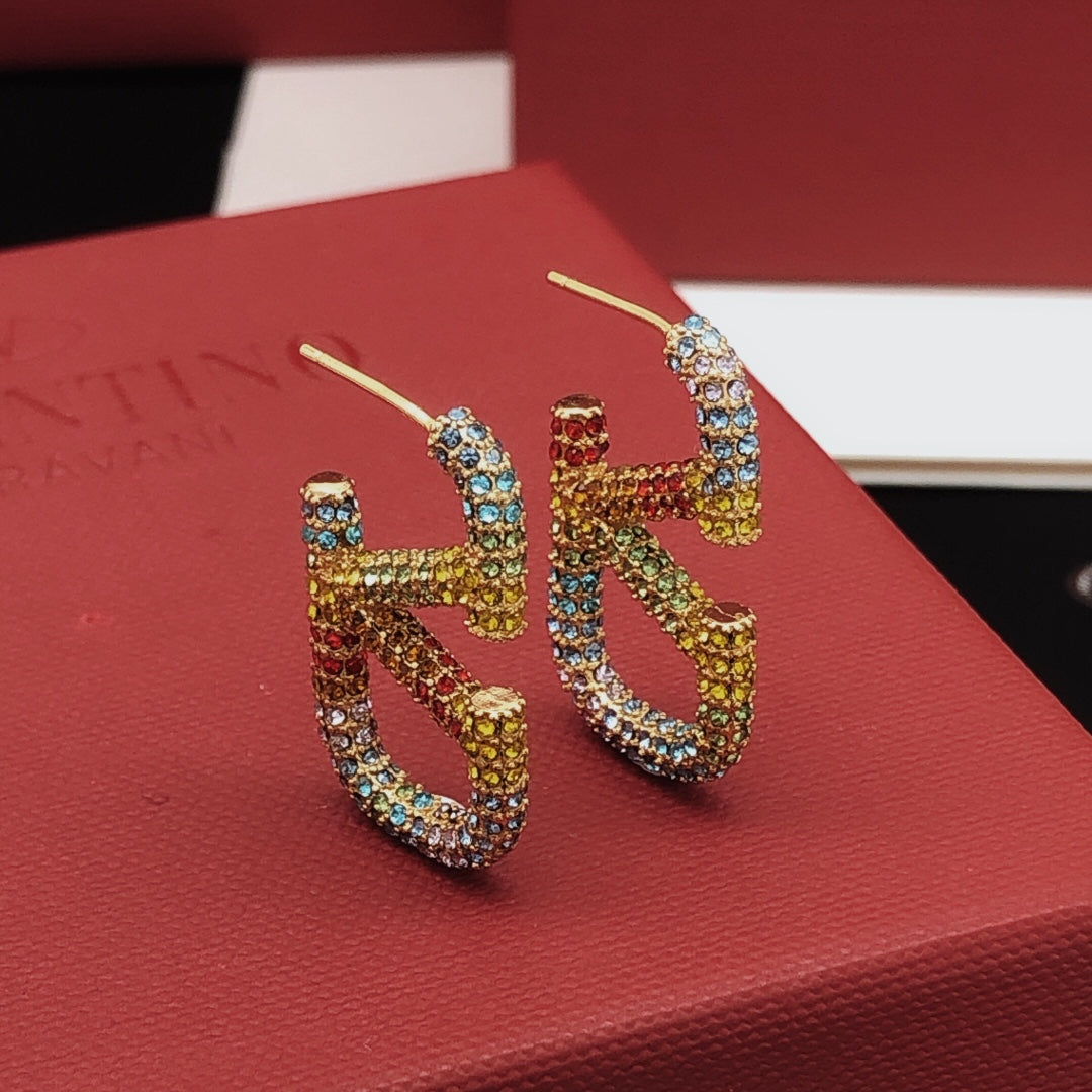 Martin Graham stud earrings in polished metal-tone – front view
