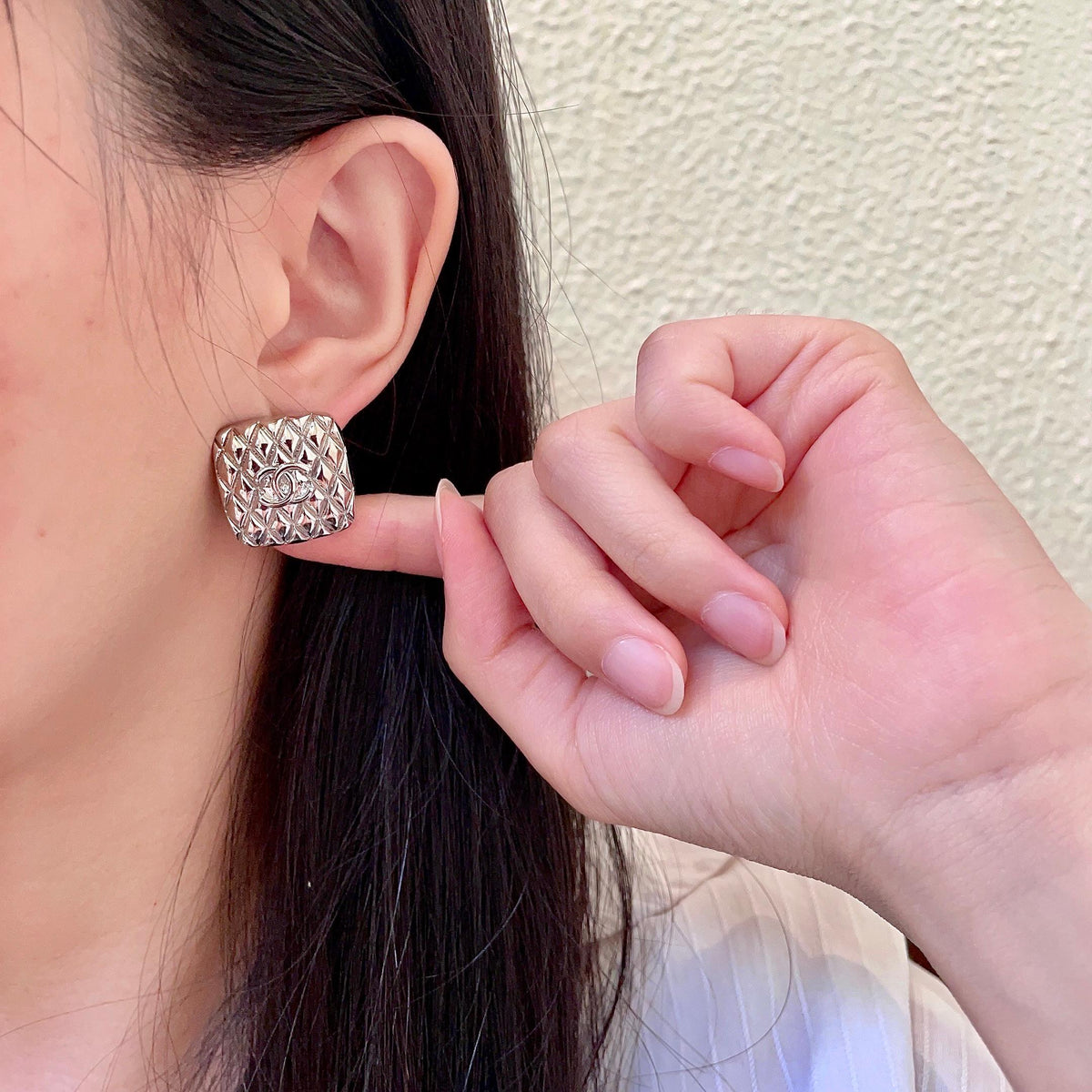 Martin Graham stud earrings in polished metal-tone – front product view
