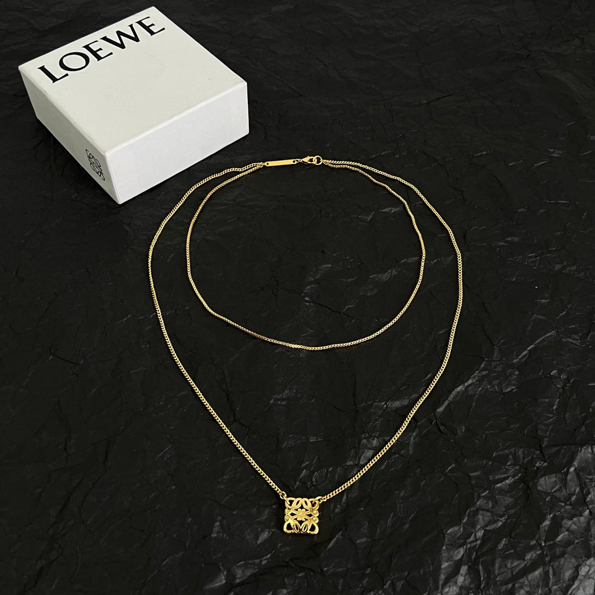 Martin Graham pendant necklace in polished metal-tone – front view