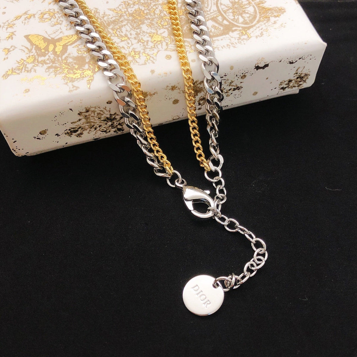 Martin Graham pendant necklace in polished metal-tone – front view