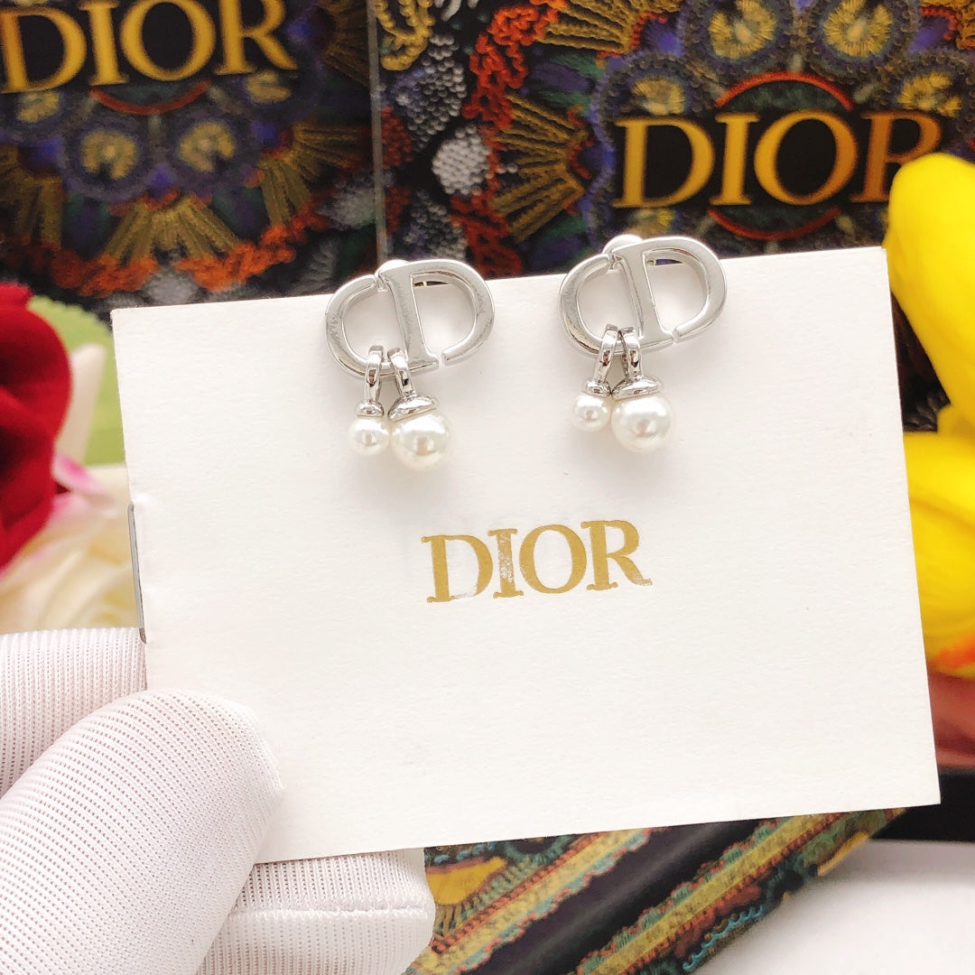 Martin Graham stud earrings in polished metal-tone – front view