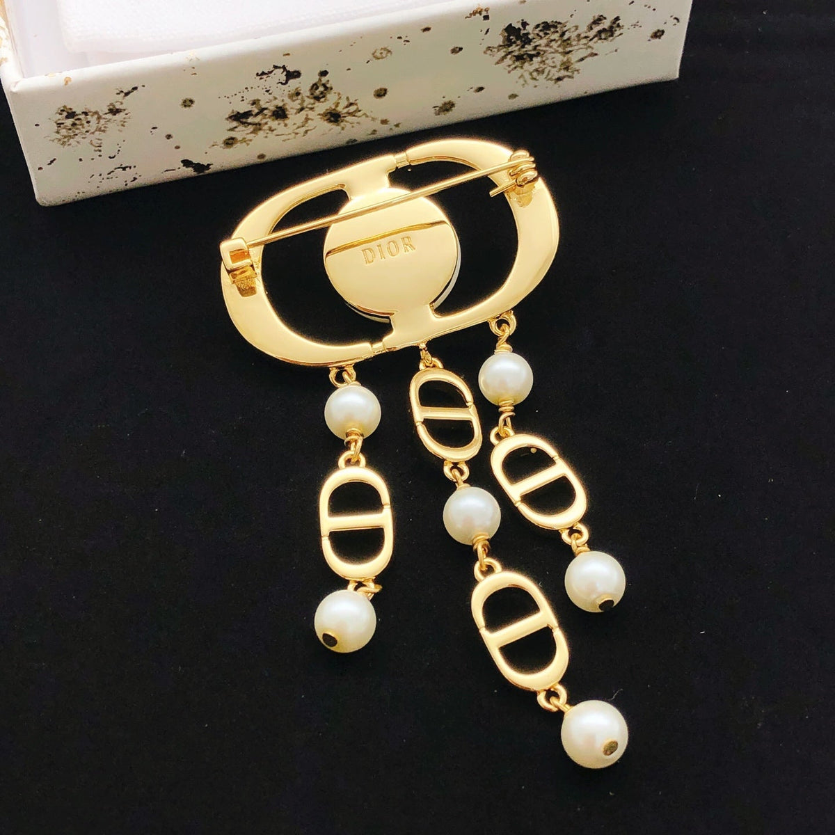 Martin Graham brooch in polished metal-tone – front view