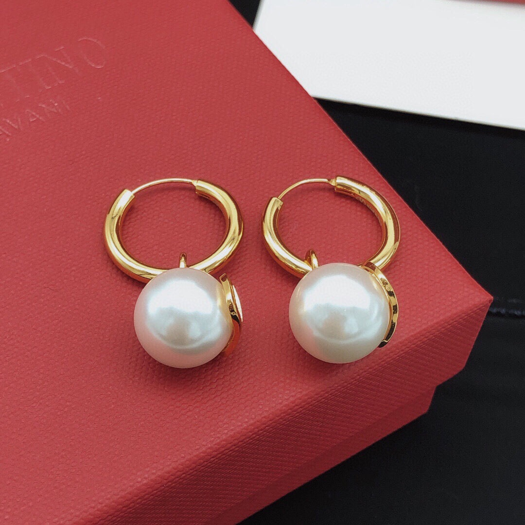Martin Graham drop earrings in polished metal-tone – front view