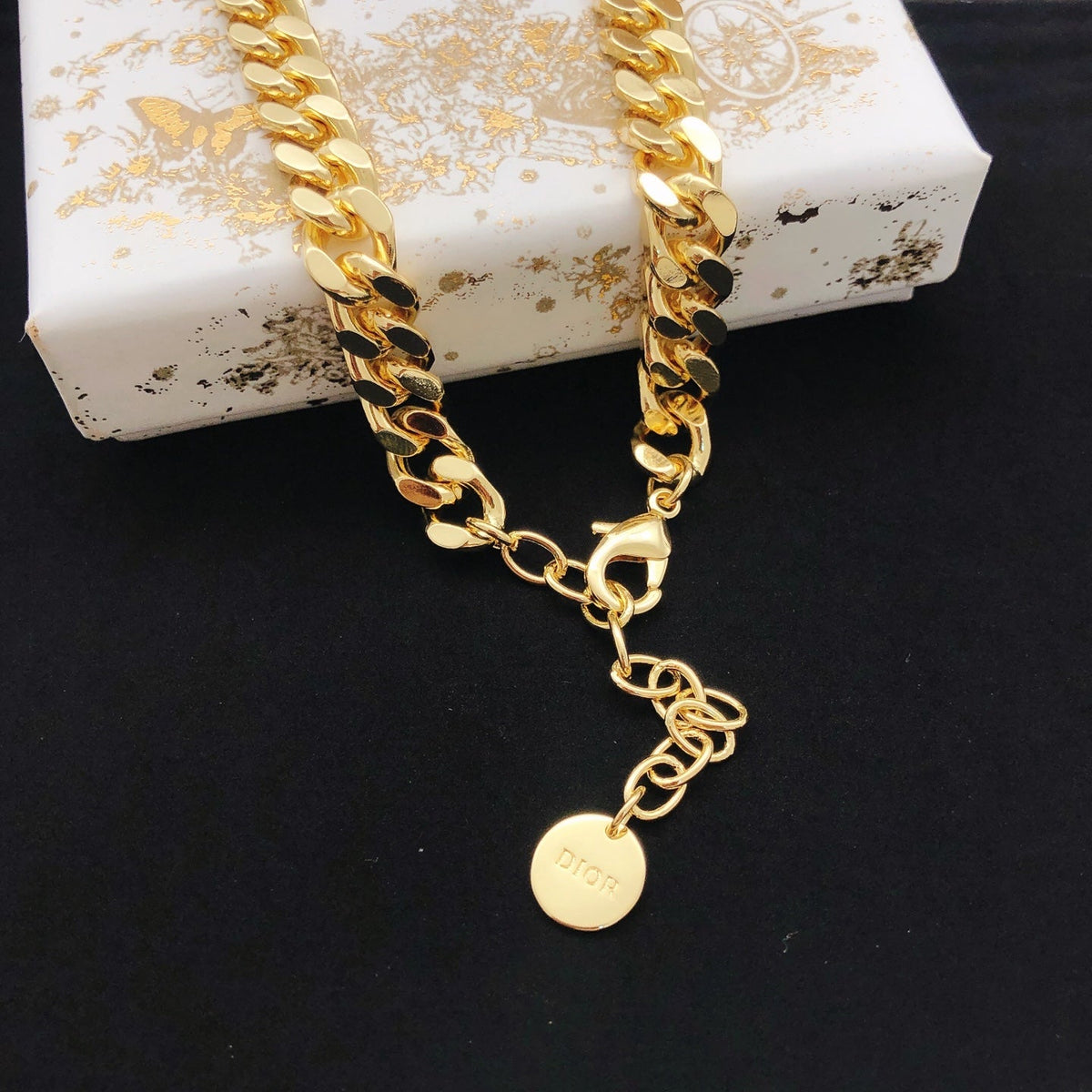Martin Graham pendant necklace in polished metal-tone – front view