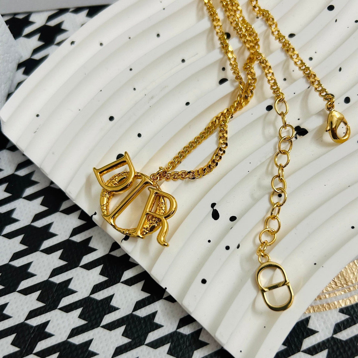 Martin Graham pendant necklace in polished metal-tone – front view