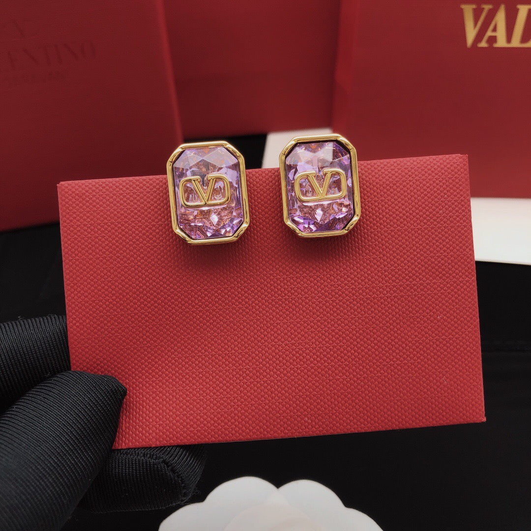 Martin Graham stud earrings in polished metal-tone – front view