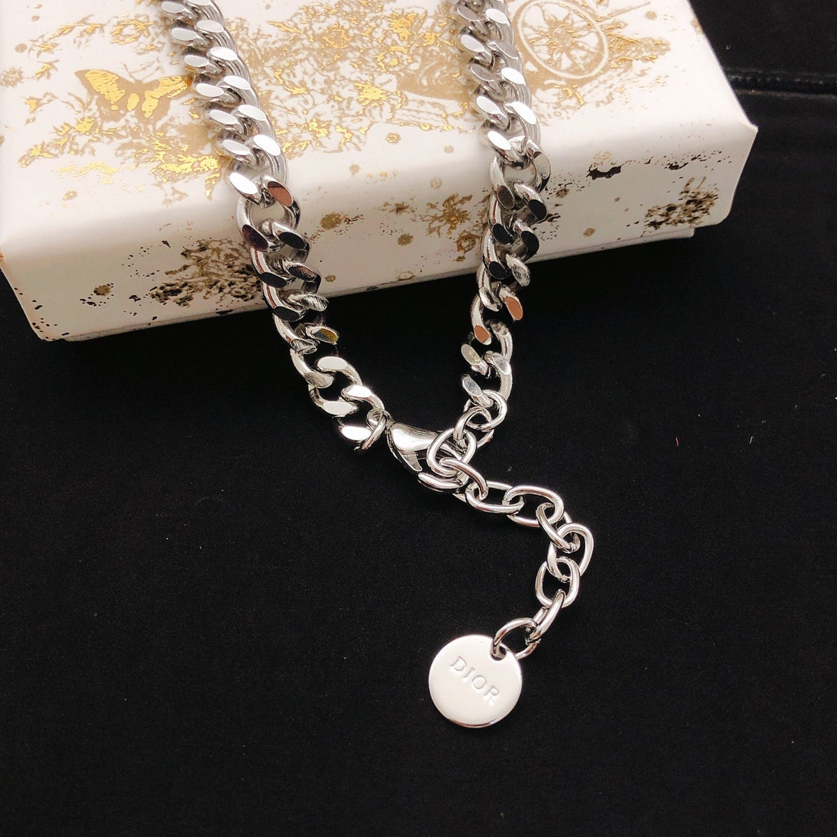 Martin Graham pendant necklace in polished metal-tone – front view