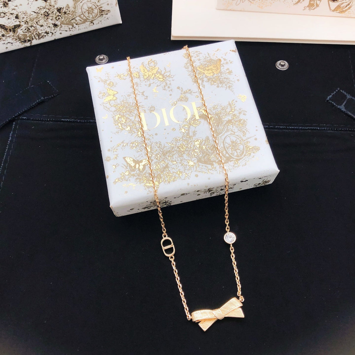Martin Graham pendant necklace in polished metal-tone – front view