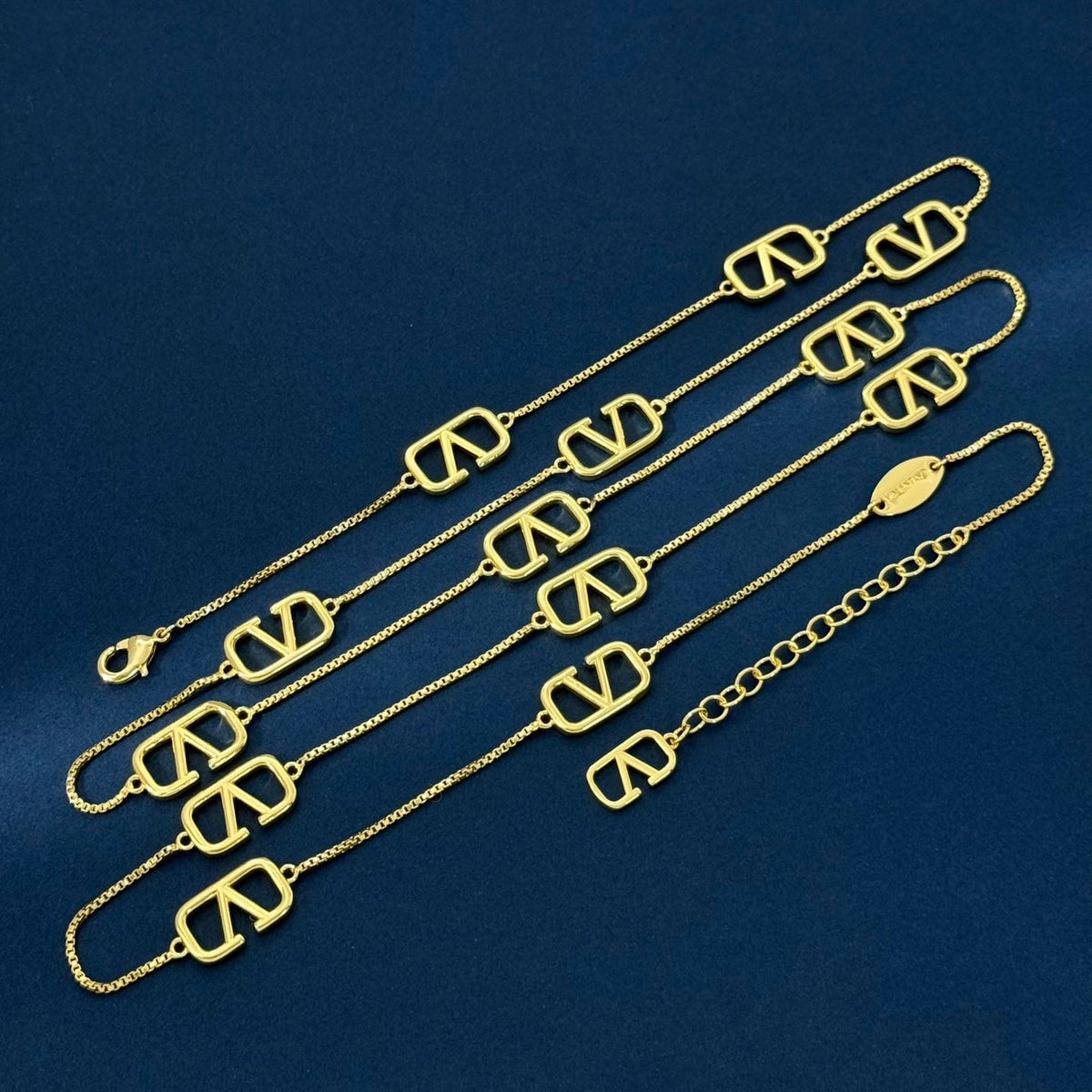Martin Graham pendant necklace in polished metal-tone – front view