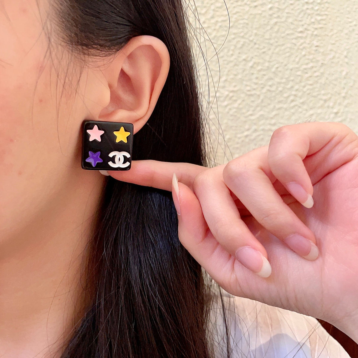 Martin Graham stud earrings in polished metal-tone – front product view