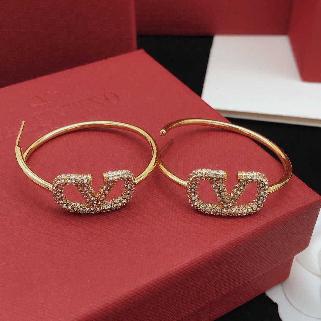 Martin Graham earrings in polished metal-tone – front view