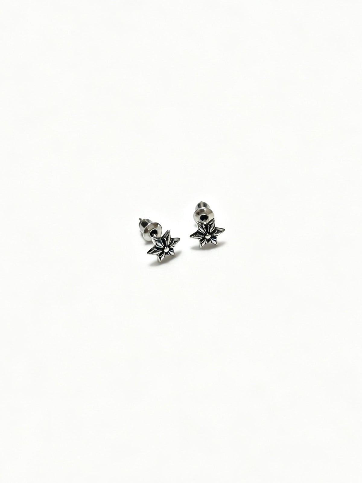Martin Graham earrings in polished metal-tone – front product view
