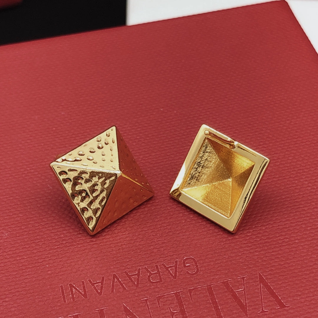 Martin Graham stud earrings in polished metal-tone – front view