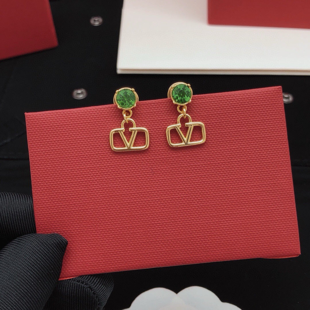 Martin Graham stud earrings in polished metal-tone – front view