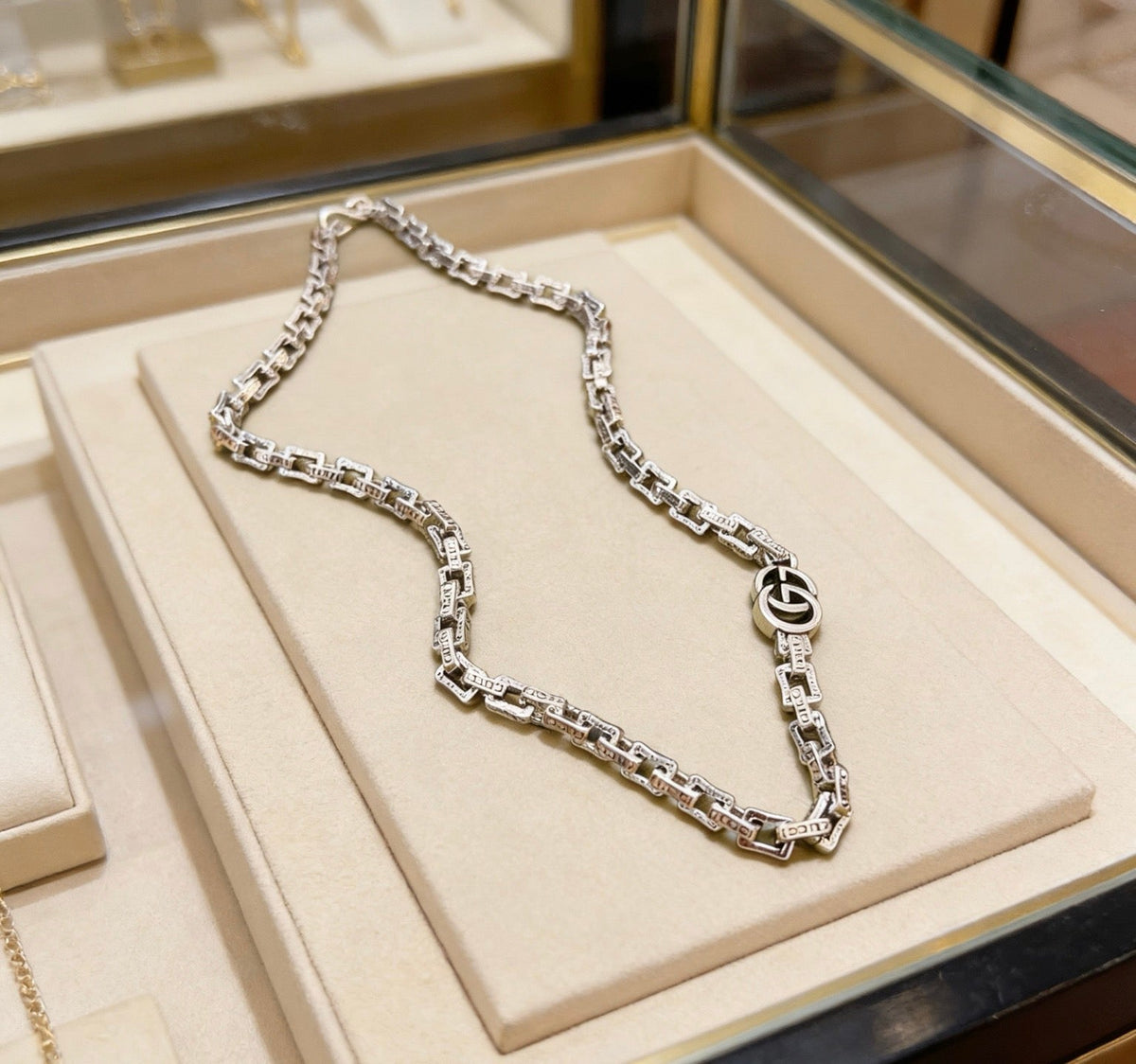 Martin Graham pendant necklace in polished metal-tone – front product view