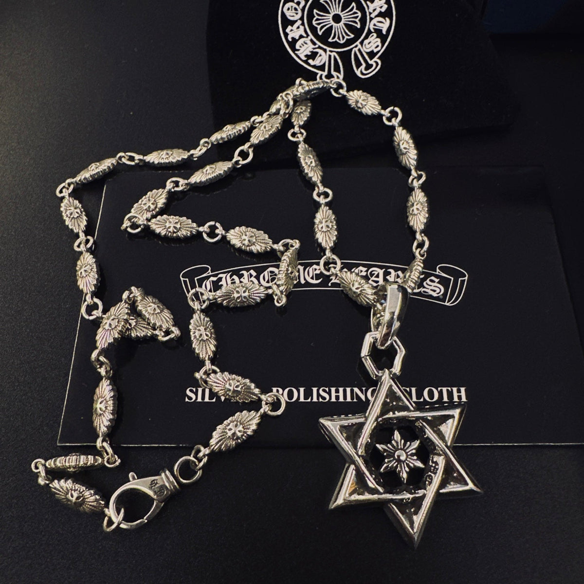Martin Graham pendant necklace in polished metal-tone – front product view