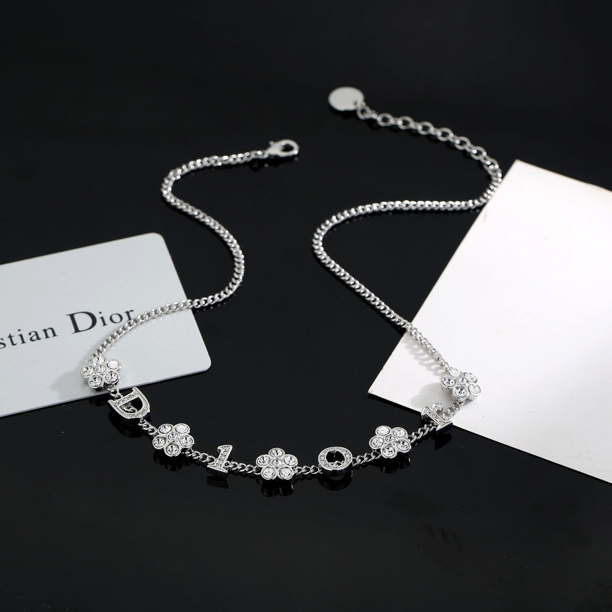 Martin Graham pendant necklace in polished metal-tone – front view