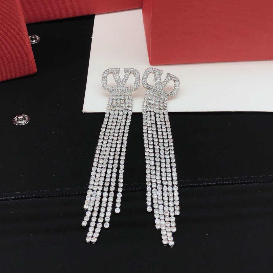 Martin Graham stud earrings in polished metal-tone – front view