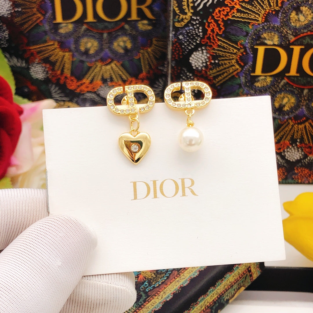Martin Graham stud earrings in polished metal-tone – front view
