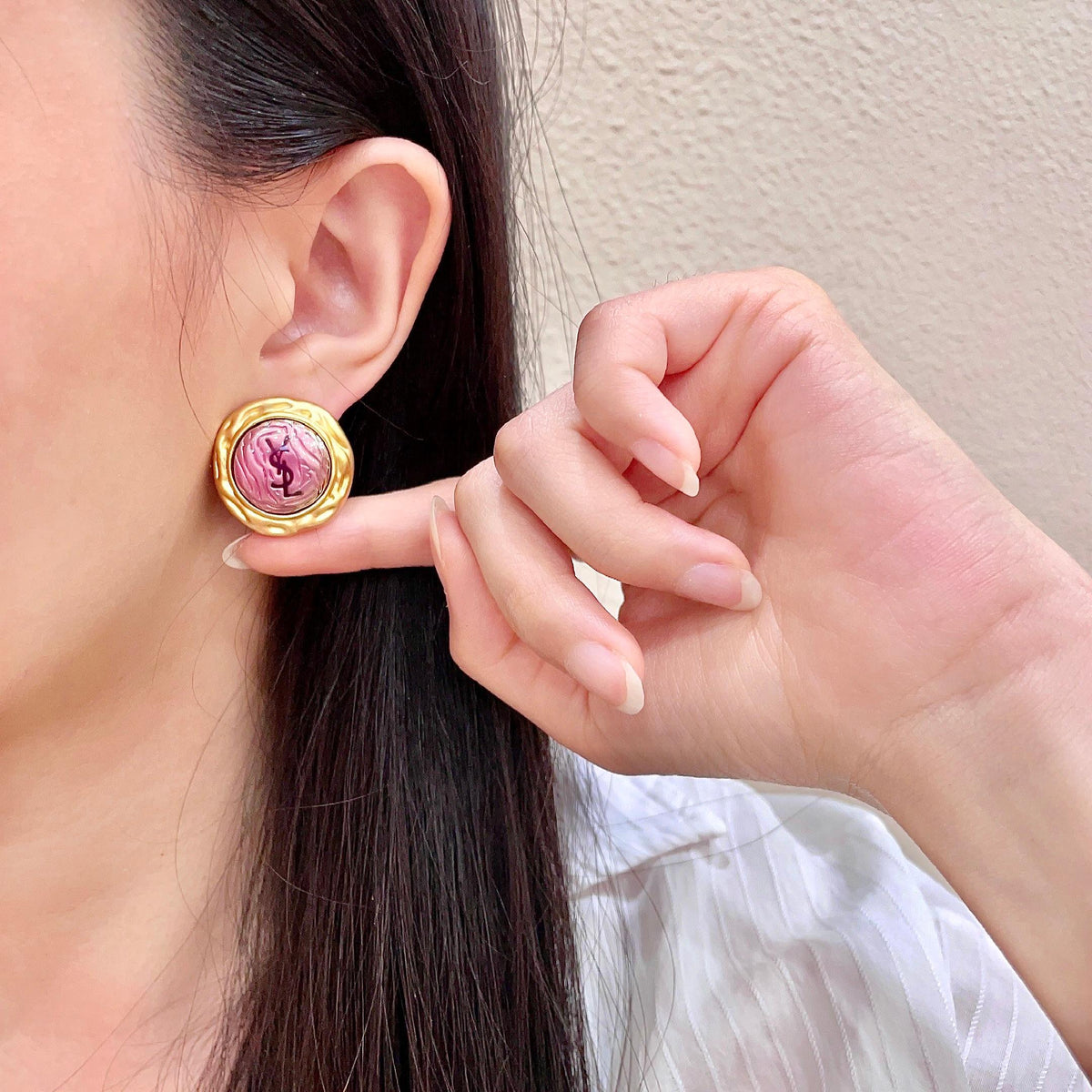 Martin Graham stud earrings in polished metal-tone – front product view
