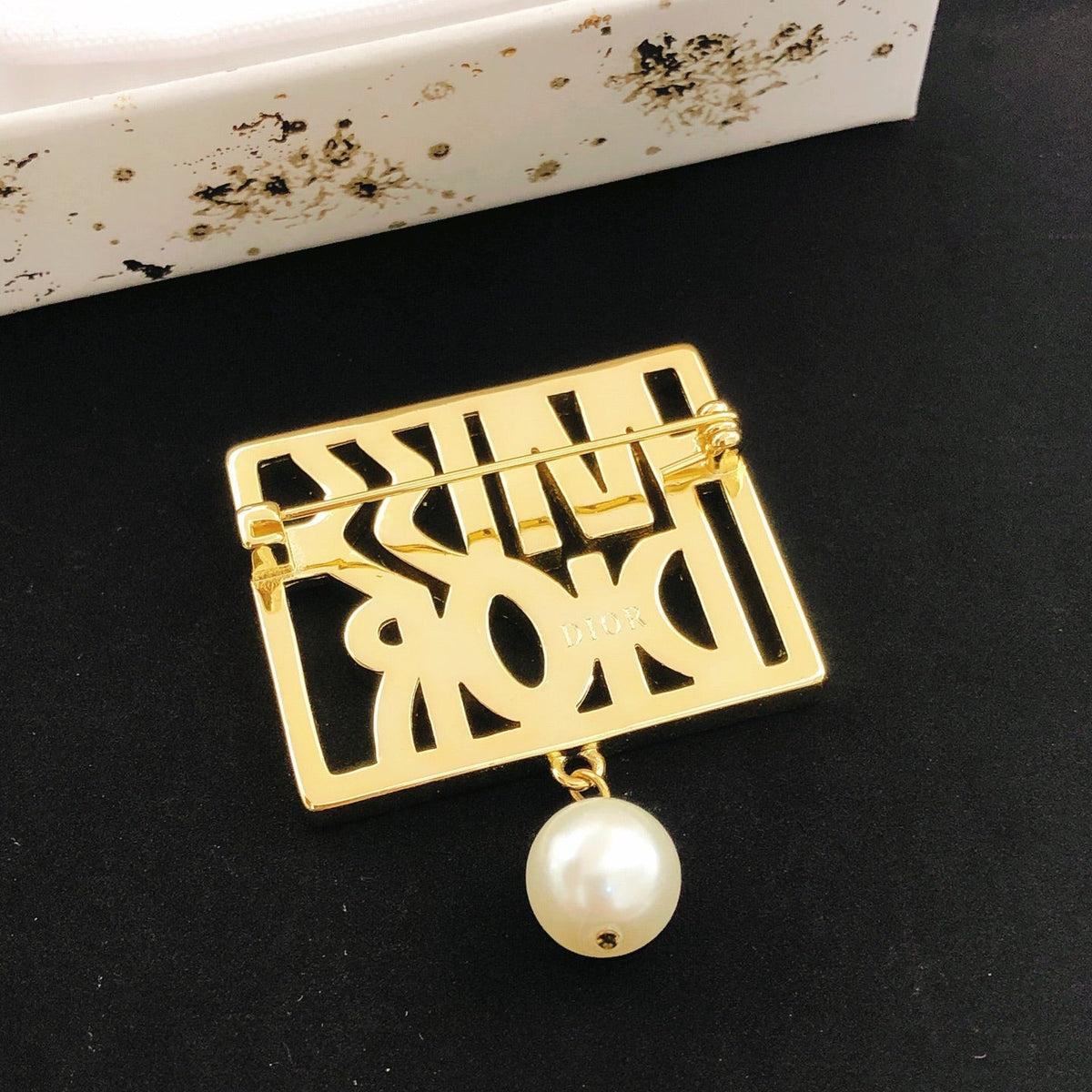 Martin Graham brooch in polished metal-tone – front view