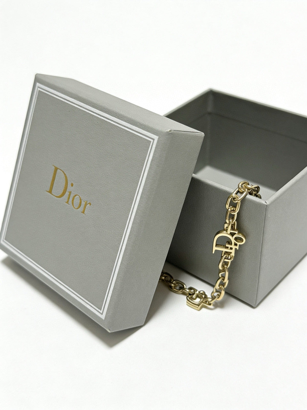 Martin Graham pendant necklace in polished metal-tone – front view