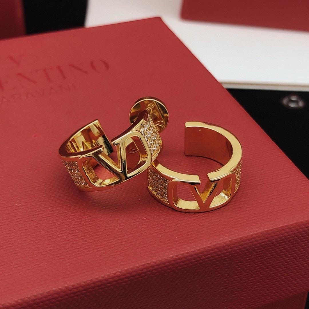 Martin Graham drop earrings in polished metal-tone – front view