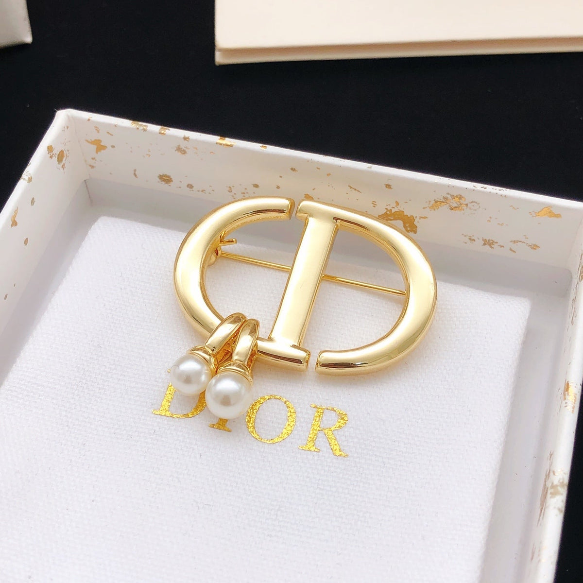 Martin Graham brooch in polished metal-tone – front view