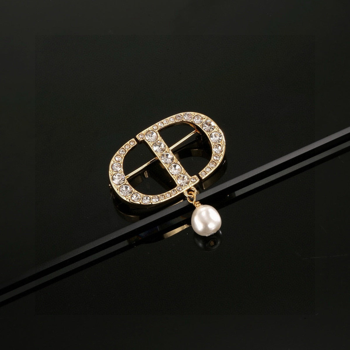Martin Graham brooch in polished metal-tone – front view