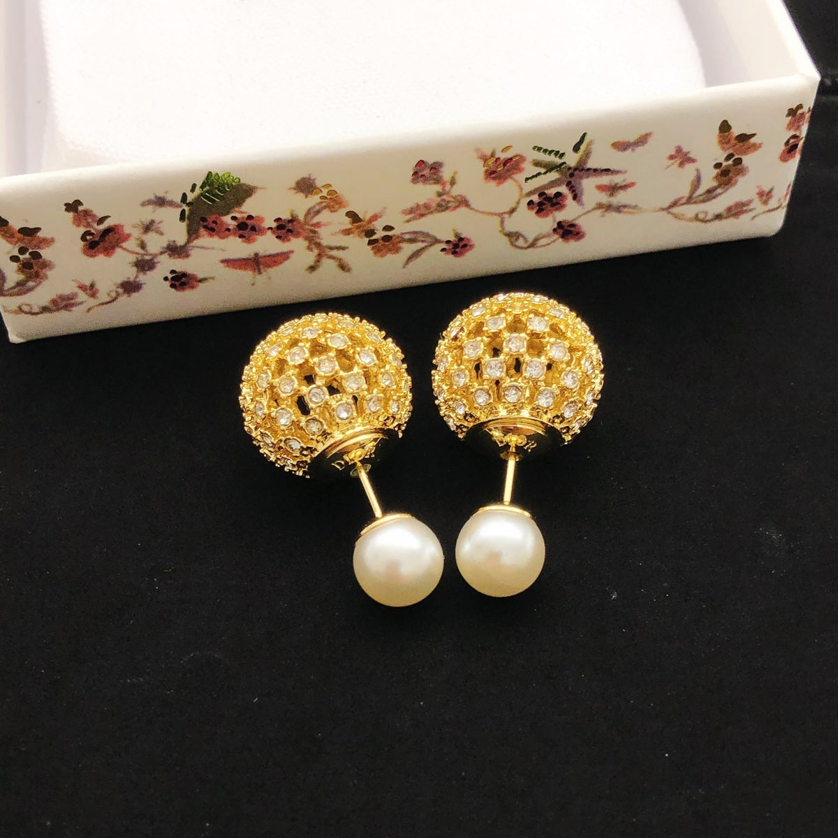 Martin Graham stud earrings in polished metal-tone – front view