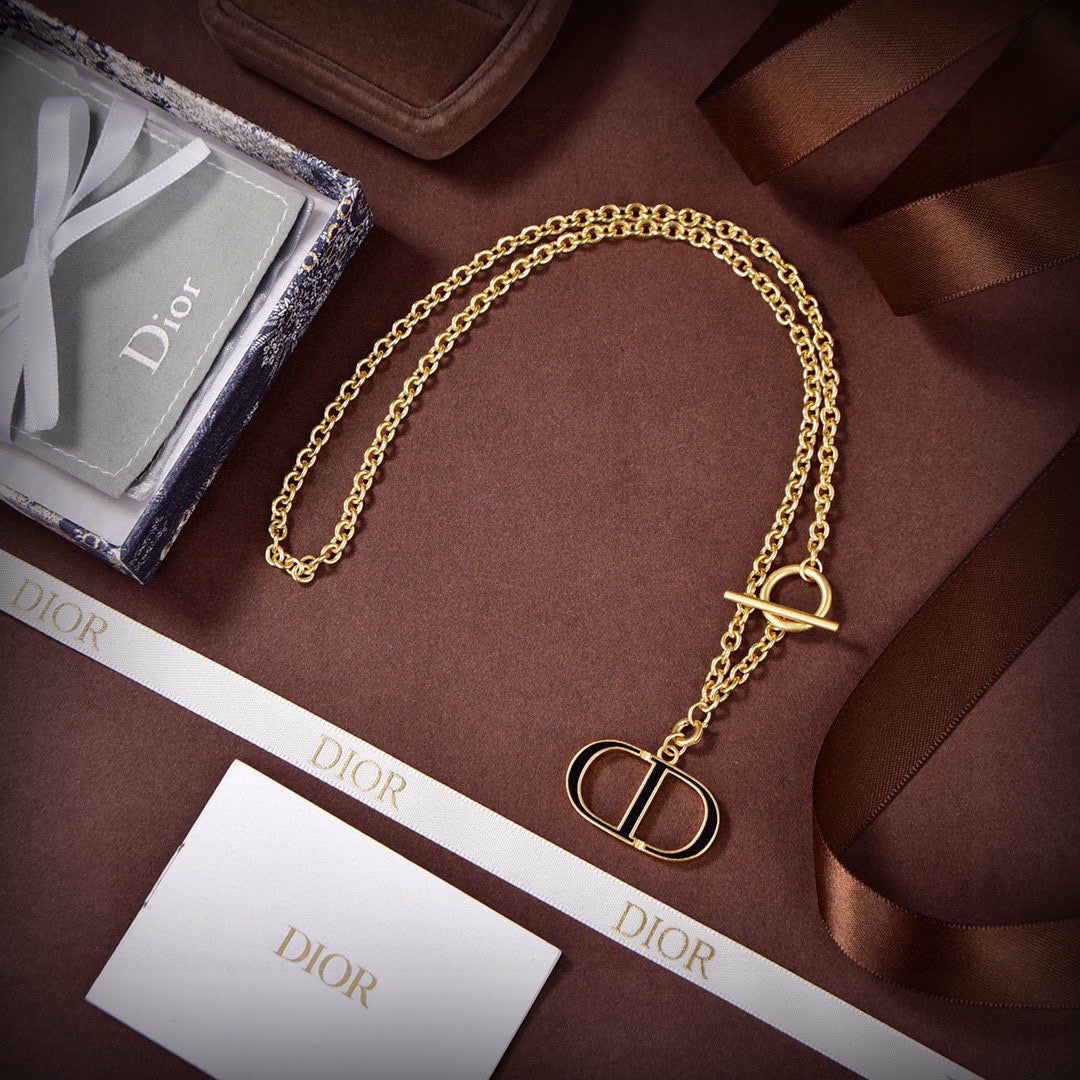 Martin Graham pendant necklace in polished metal-tone – front view