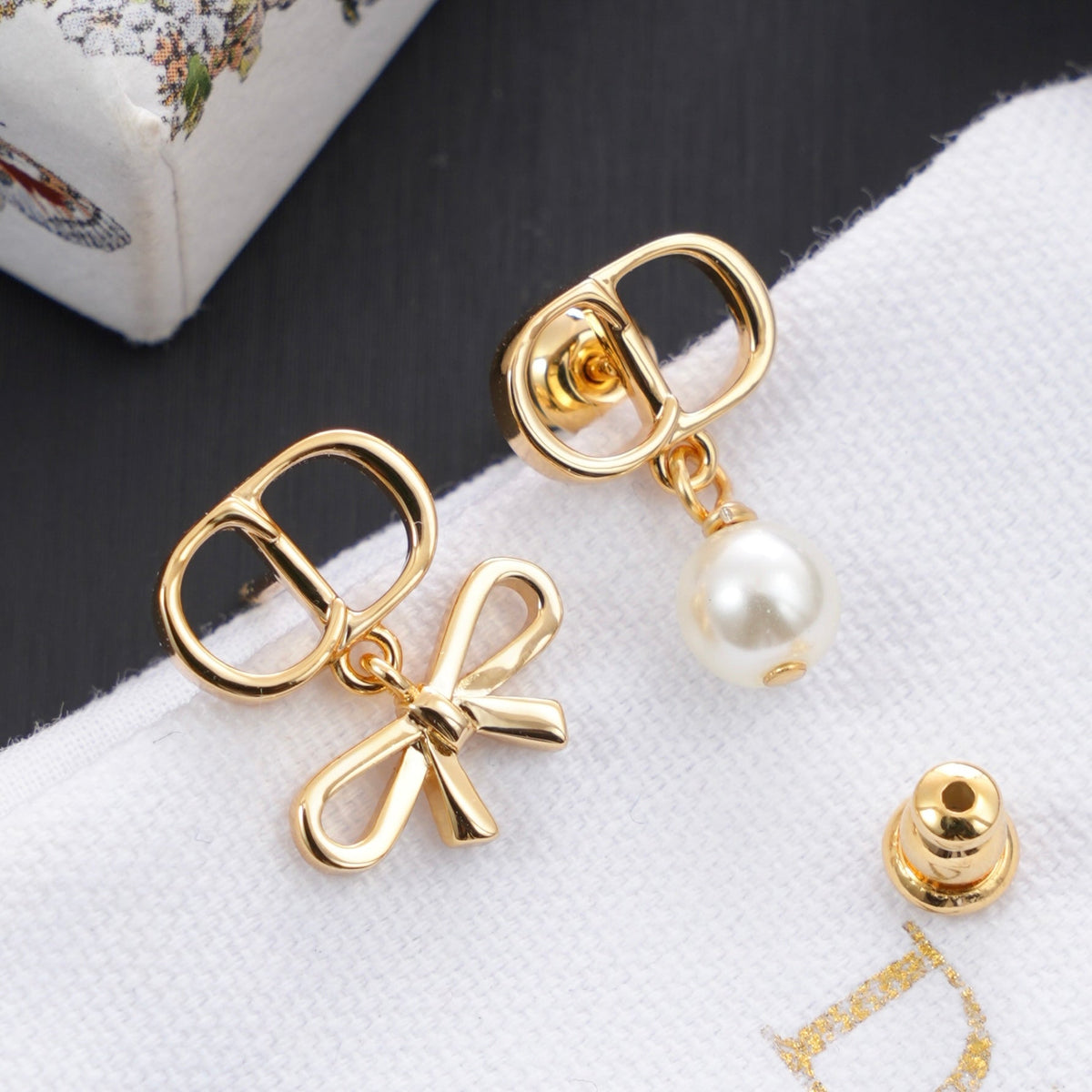 Martin Graham earrings in polished metal-tone – front view