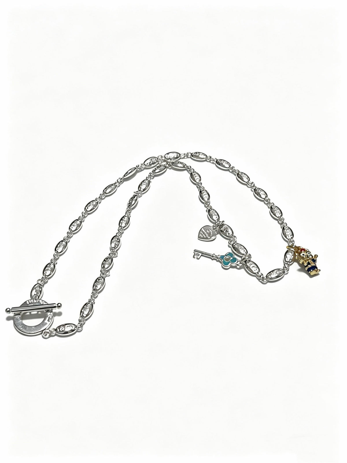 Martin Graham pendant necklace in polished metal-tone – front product view