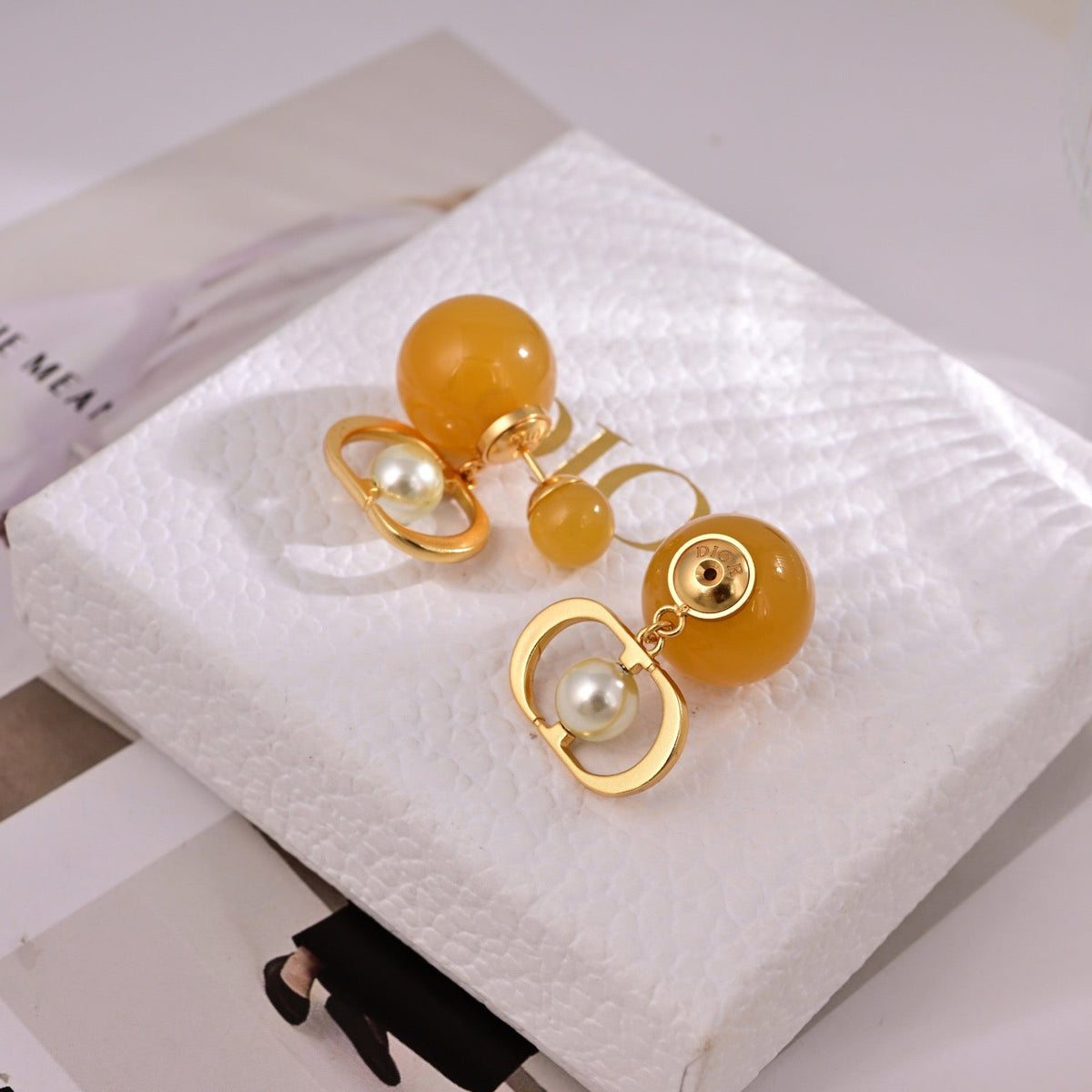 Martin Graham earrings in polished metal-tone – front view