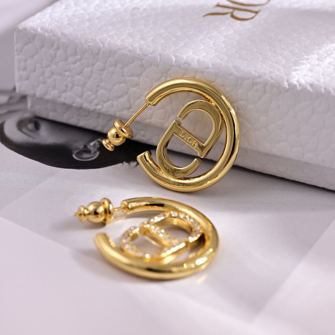 Martin Graham earrings in polished metal-tone – front view
