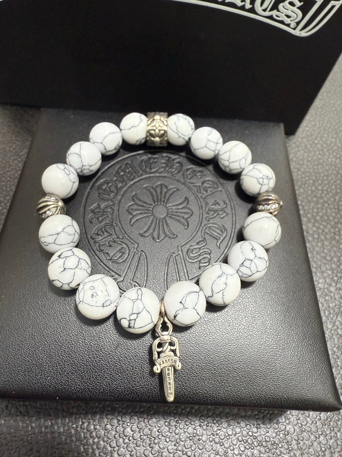 Martin Graham jewelry accessory in polished metal-tone – front product view