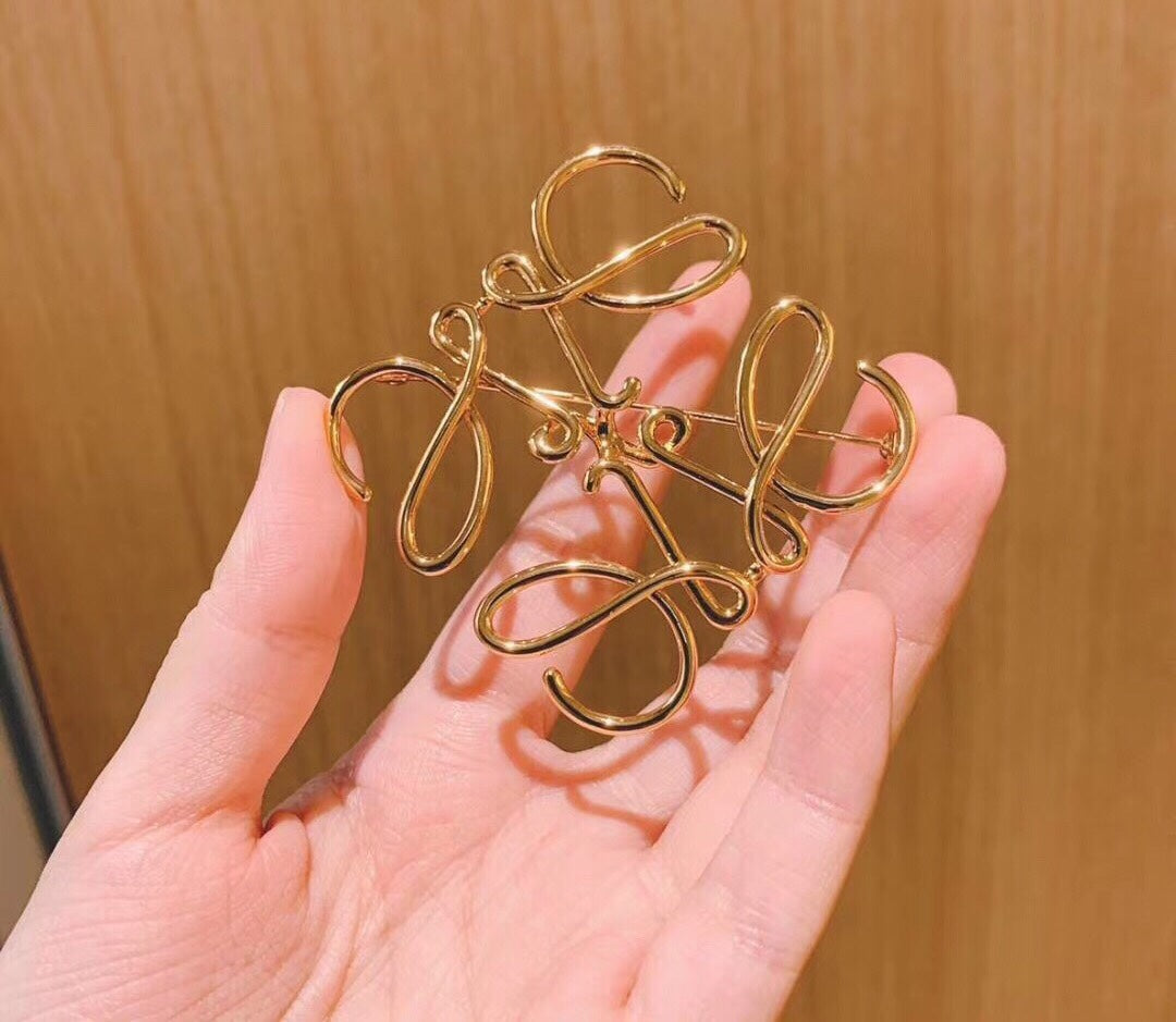 Martin Graham brooch in polished metal-tone – front view