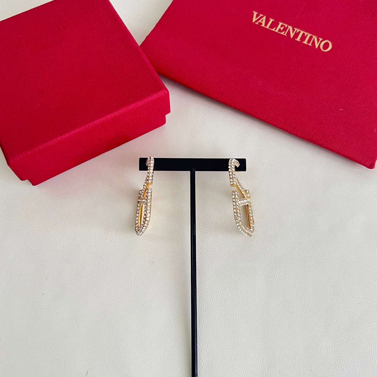 Martin Graham earrings in polished metal-tone – front view