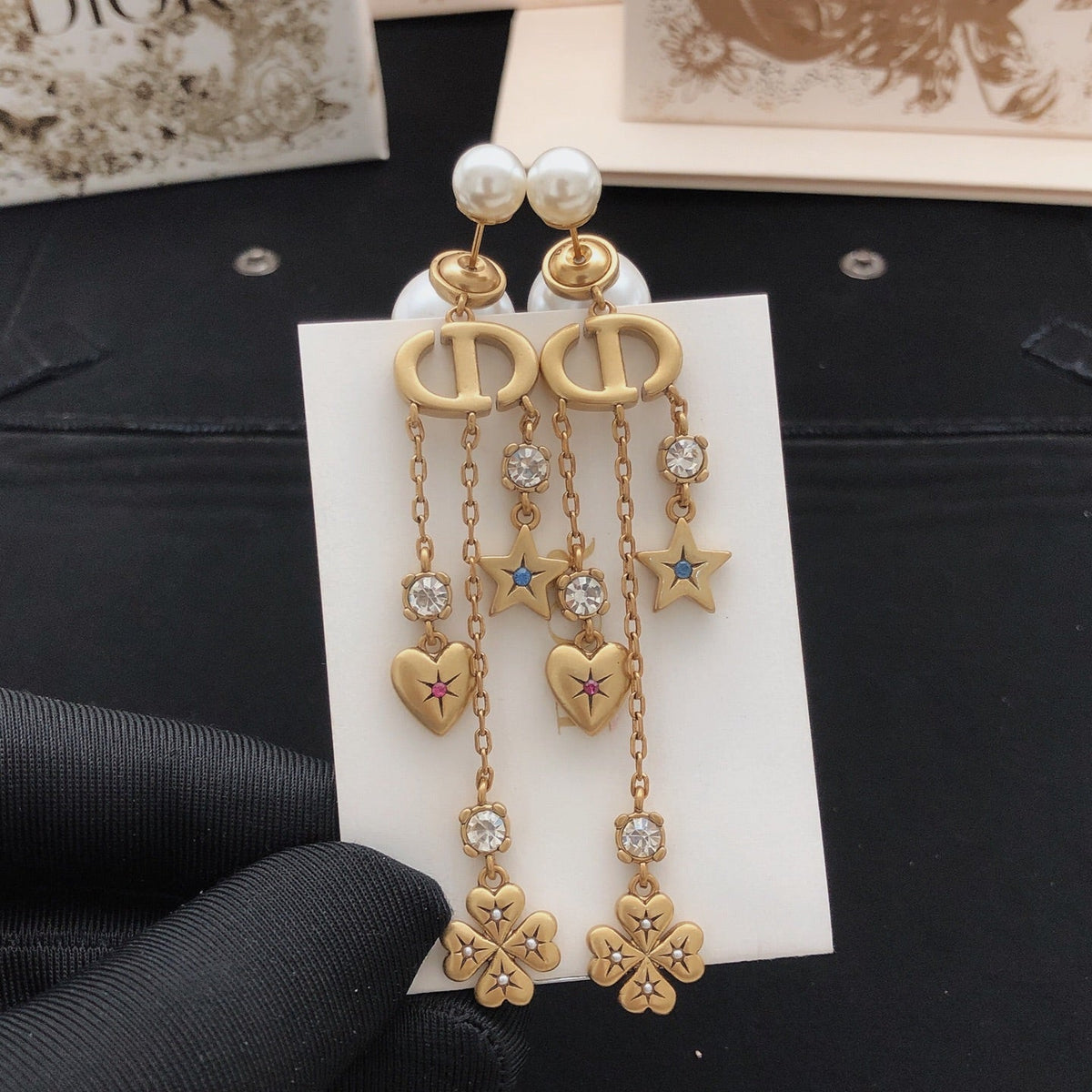 Martin Graham stud earrings in polished metal-tone – front view