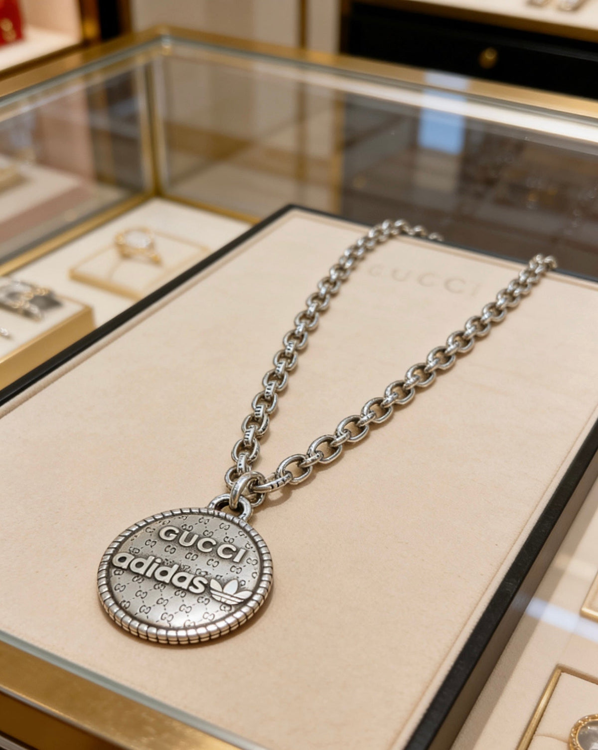 Martin Graham pendant necklace in polished metal-tone – front product view