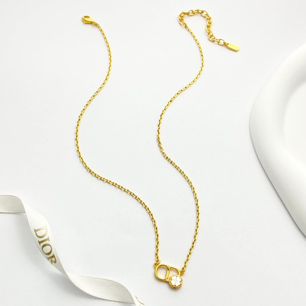 Martin Graham pendant necklace in polished metal-tone – front view