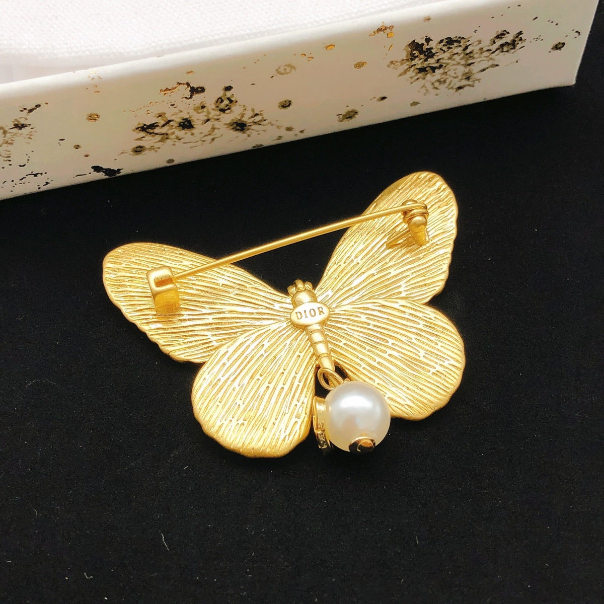 Martin Graham brooch in polished metal-tone – front view