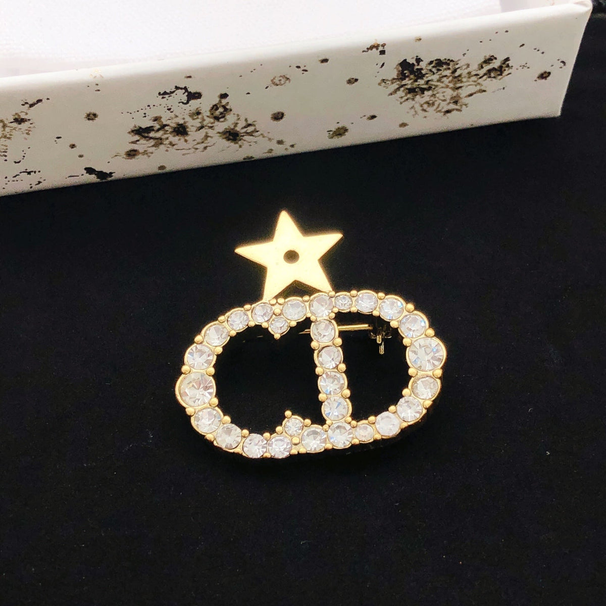 Martin Graham brooch in polished metal-tone – front view